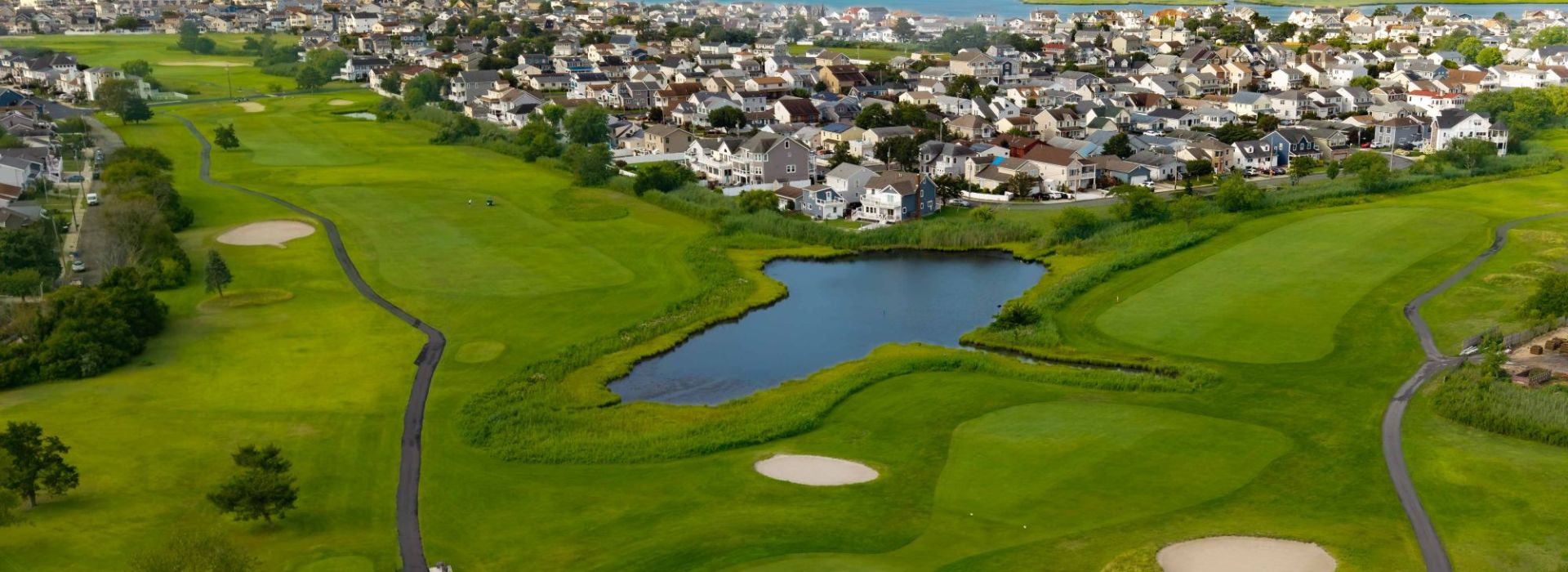 Bird's Eye view of golf course and surrounding community